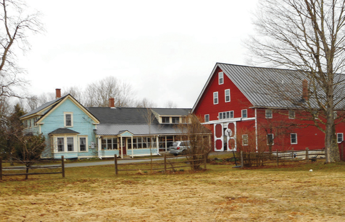 Our former farm in Maine. The house, carriage shed and barn run east to west, capture plenty of solar energy and place a narrow face to the prevailing winds. The offset barn allows the wind to pass through, removing any odors and helping condition stored hay.